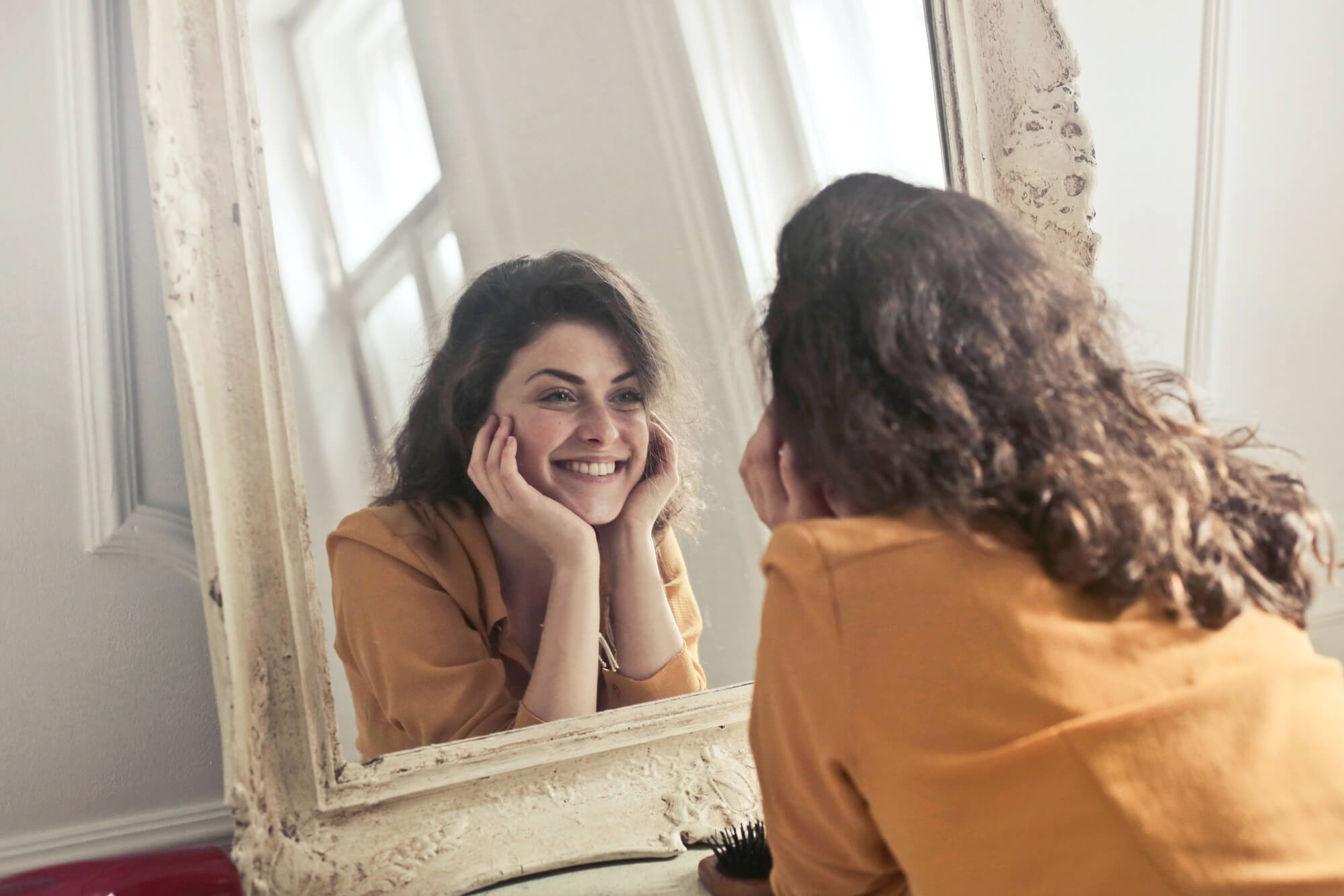 Smiling Girl in Mirror